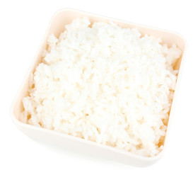 Cooked rice in bowl isolated on white