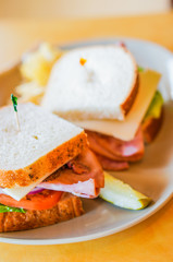 Club sandwich with ham and cheese