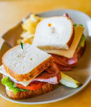 Club sandwich with ham and cheese