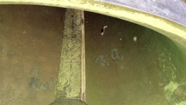 Tiny hole found inside interior the big old steel bell