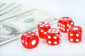 Red dices and money, isolated on white