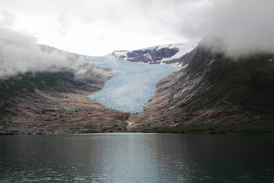glacier and clouds