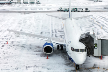 Passenger Airplane on airfield winter