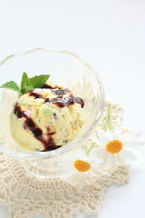 Vanilla ice cream with flower on background