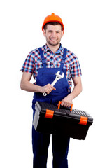 Man holding toolbox and wrench