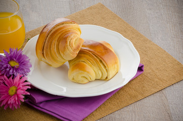 Croissants with orange juice