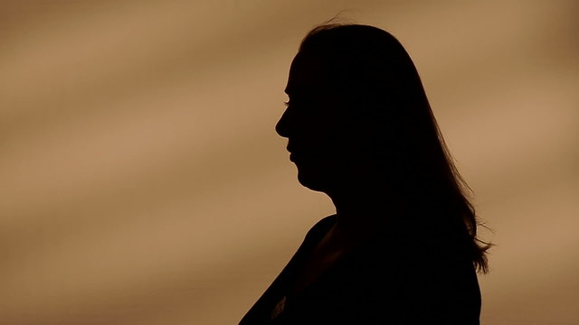 Female silhouette talking