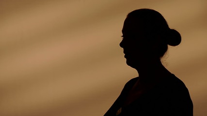 Female silhouette talking
