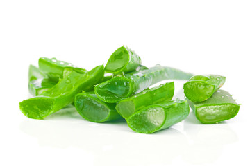Sliced aloe leaves isolated on white background
