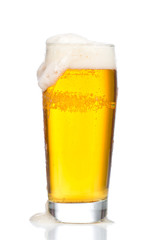 Glass of beer on white background