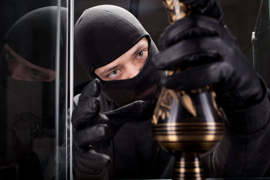 burglar wearing black mask