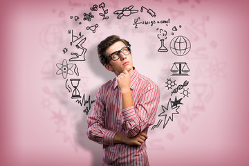 young man scientist with glasses thinking