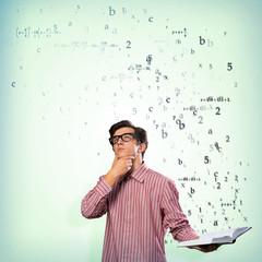 young scientist holding a book