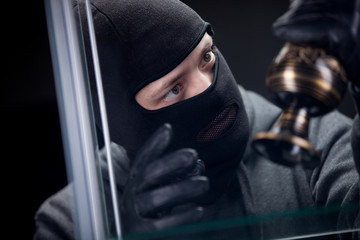 burglar wearing black mask