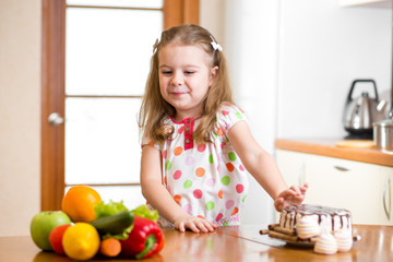 child refusing harmful food in favor of vegetables