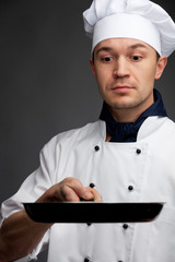 chef holding pan