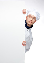 chef showing sign billboard