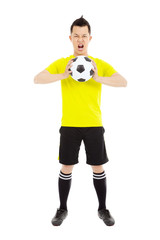 soccer player exclaimed and holding a soccer