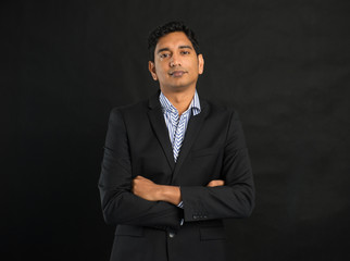 indian business man on dark background