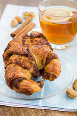 Breakfast with croissants and cup of tea