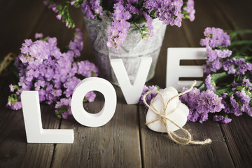 Love words and hearts with flowers