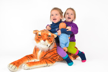 Twin Girls riding a Tiger