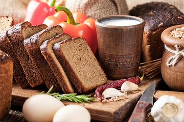 Bread rye spikelets on an old background