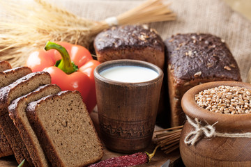 Bread rye spikelets on an old background