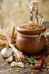 Bread rye spikelets on an old background