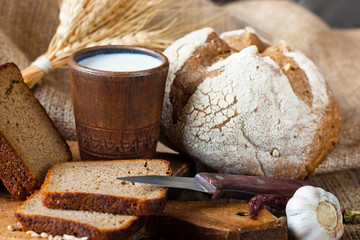 Bread rye spikelets on an old background