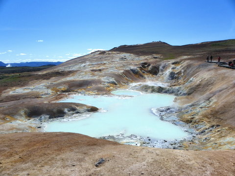 Icelandic landscape with lake and mudpot