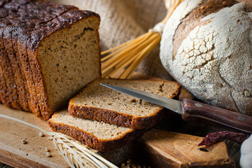 Bread rye spikelets on an old background