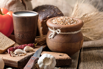 Bread rye spikelets on an old background
