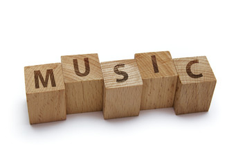 wood blocks with music word on white background