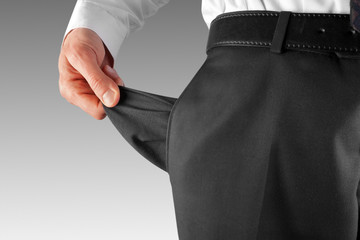 bankrupt man showing empty pocket