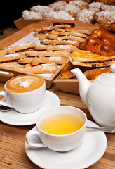Beautiful cookie and bakery with cup of coffee and tea