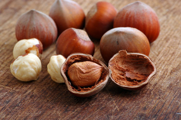 Hazelnuts, filbert on old wooden background