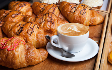 Beautiful cookie and bakery with cup of coffee