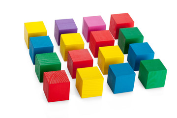 Obraz premium 4*4 square of wooden toy cubes isolated on white background