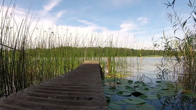 Steg, Holzsteg am See mit Sliderfahrt