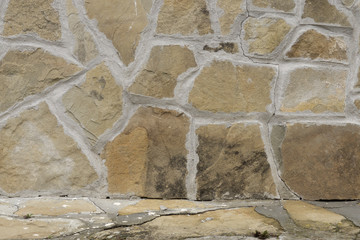 Stone wall in beige and brown