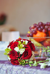 Beautiful bouquet of rose flowers on table. Wedding bouquet 