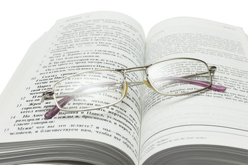 Open Bible and glasses