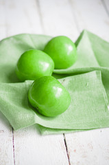 Fresh farm raised apples on rustic wooden background
