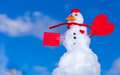 Little snowman red heart paper card outdoor. Winter.