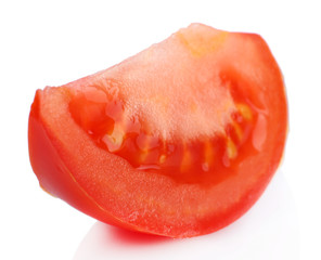 Slice of fresh tomato, isolated on white