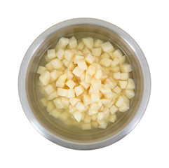 Diced potatoes in stainless steel bowl