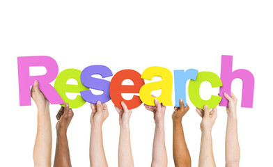 Diverse Hands Holding Up Research