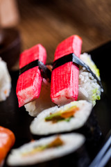 Sushi set on the wooden table