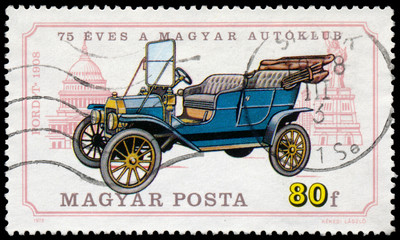 Fototapeta na wymiar HUNGARY - CIRCA 1975: A stamp printed in Hungary shows retro car